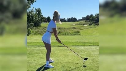 Paige Spiranac goes braless and risks wardrobe malfunction as。